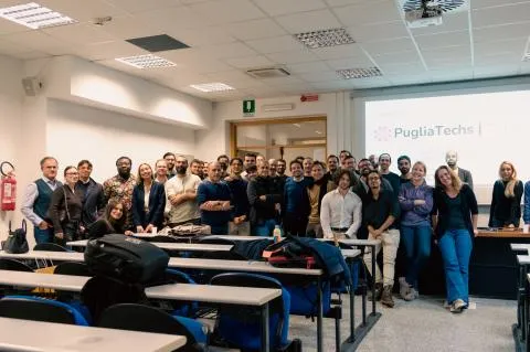 The PugliaTechs community together at a PugliaTechs Talks event